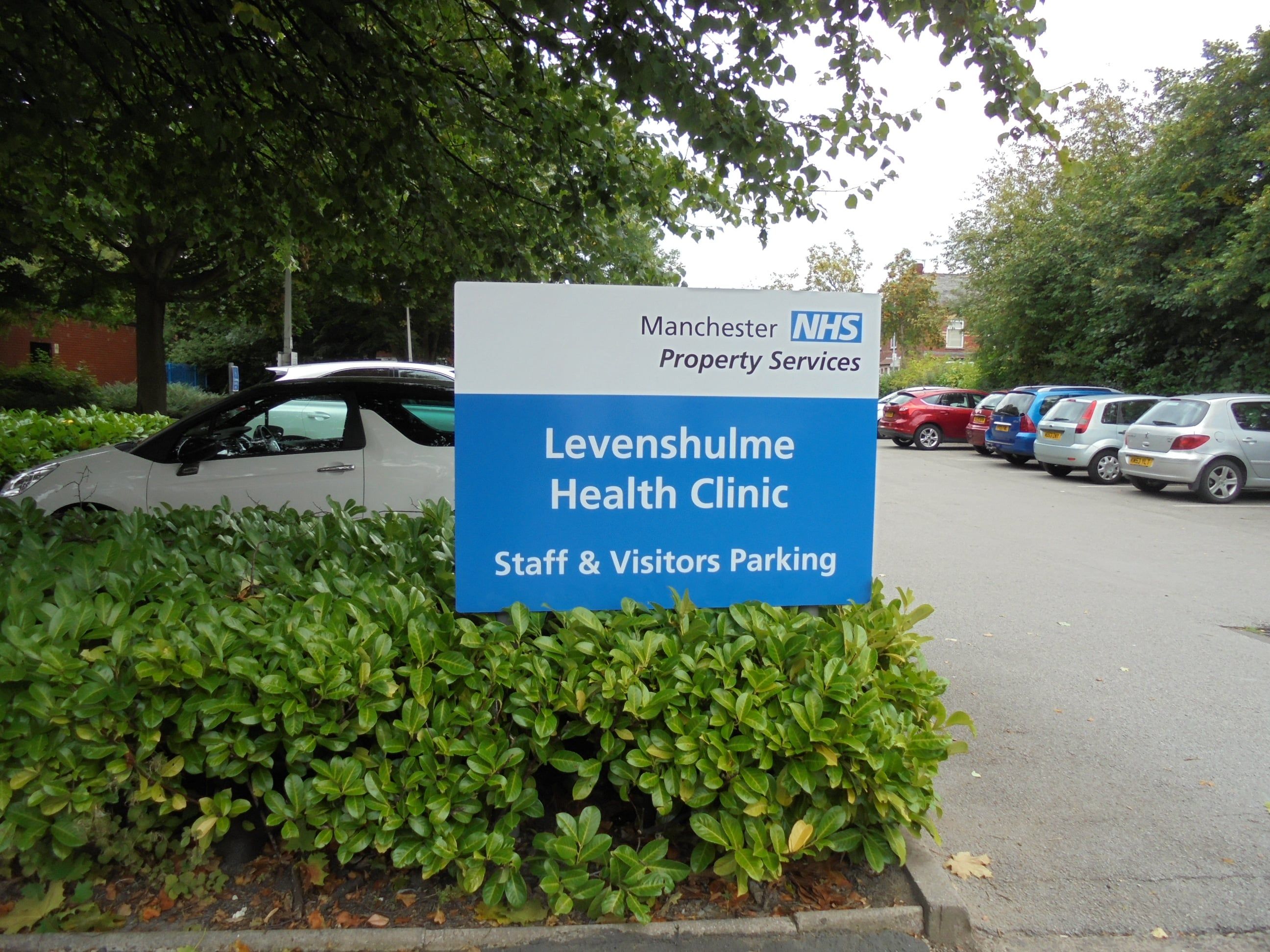 NHS health sector panel and channel car park sign